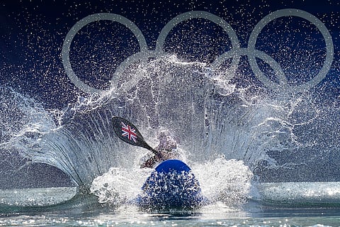 Kimberley Woods competes in women's kayak cross